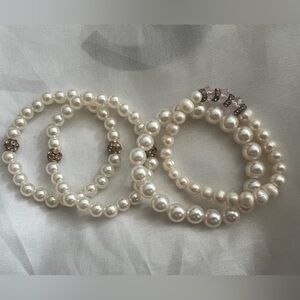 4 pearl costume bracelets with various beads attached